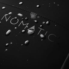 NOMATIC 20L Travel Pack - Water Resistant Laptop Bag - TSA-Ready Expandable Backpack (Black)