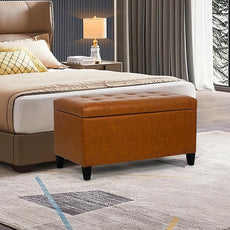 Joveco Storage Ottoman Bench, 33 Inches Faux Leather Rectangle Tufted Foot Stool for End Foot of Bed, Bedroom, Living Room, Cognac Brown