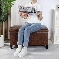 Joveco Storage Ottoman Bench, 33 Inches Faux Leather Rectangle Tufted Foot Stool for End Foot of Bed, Bedroom, Living Room, Walnut